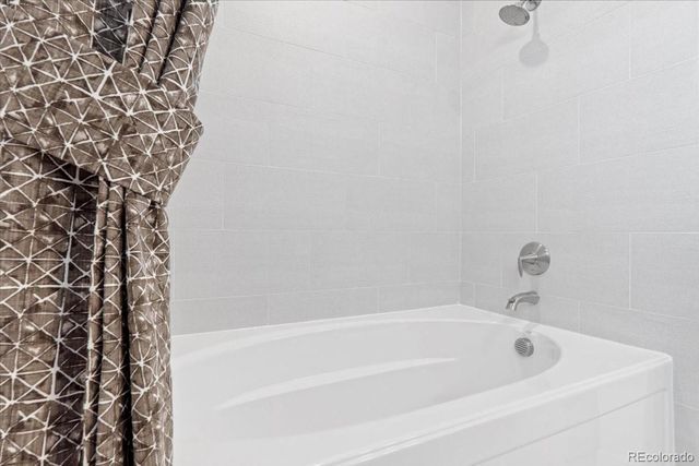 6153 N Ceylon Street 9-102, Denver, CO 80249