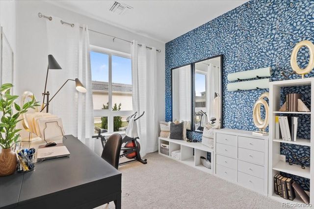 6153 N Ceylon Street 9-102, Denver, CO 80249