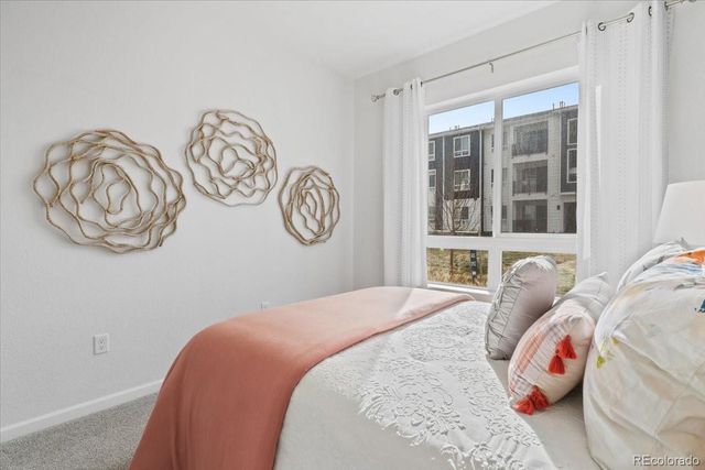 6153 N Ceylon Street 9-102, Denver, CO 80249