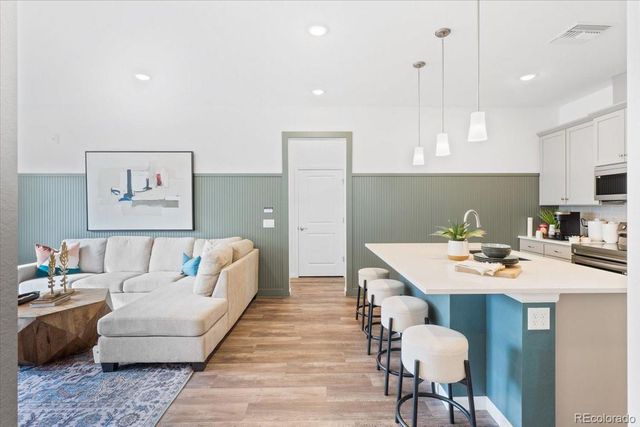 6153 N Ceylon Street 9-102, Denver, CO 80249