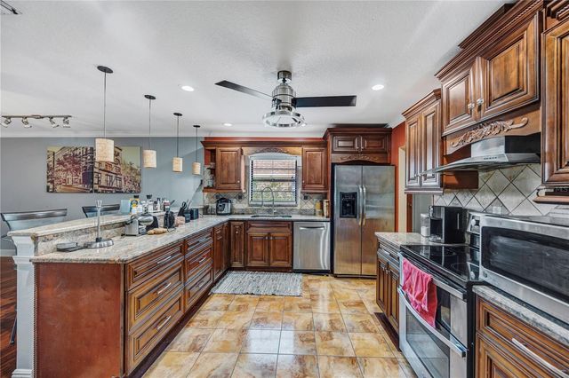 4953 PENNSBURY DRIVE, Tampa, FL 33624