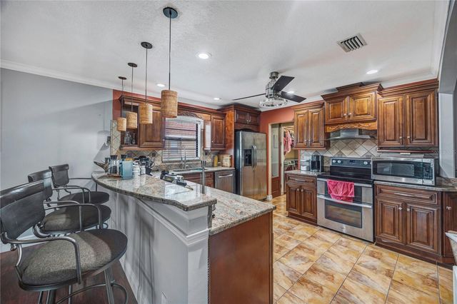4953 PENNSBURY DRIVE, Tampa, FL 33624