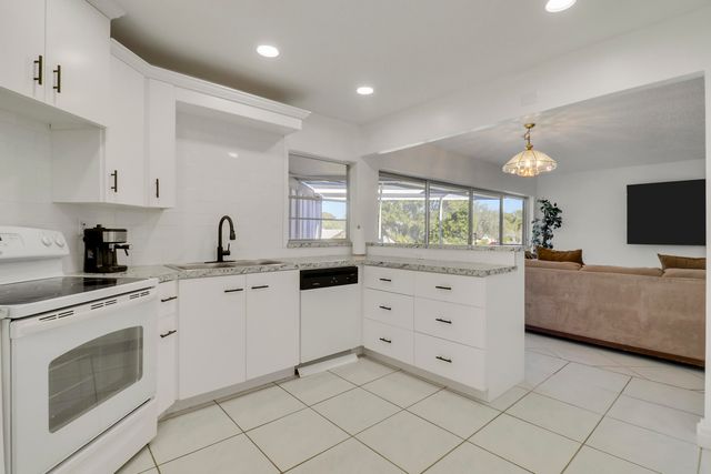 7 GREENWAY Village N 202, Royal Palm Beach, FL 33411