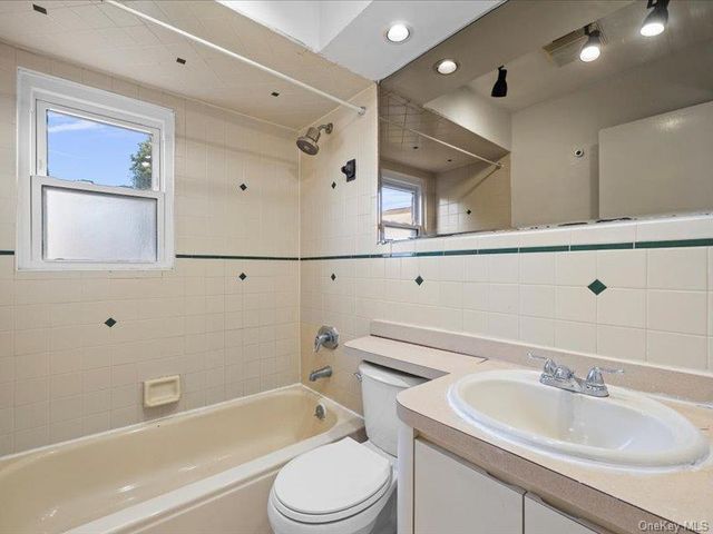 31 Broadmoor Lane, Westbury, NY 11590