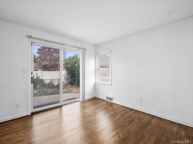 31 Broadmoor Lane, Westbury, NY 11590