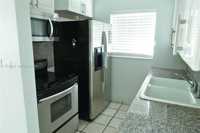 10921 N Snapper Creek Dr, Miami, FL 33173