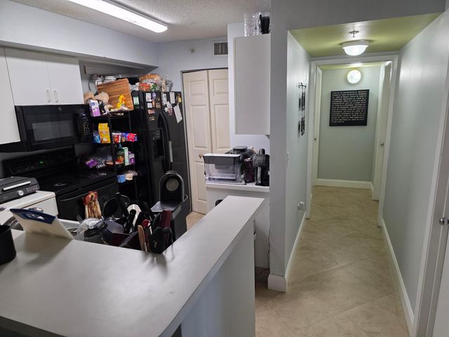 7824 SONOMA SPRINGS Circle 104, Lake Worth, FL 33463