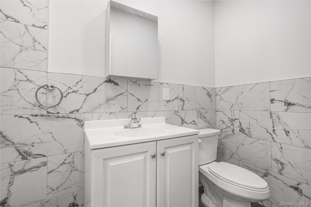 9011 77th Street, Woodhaven, NY 11421