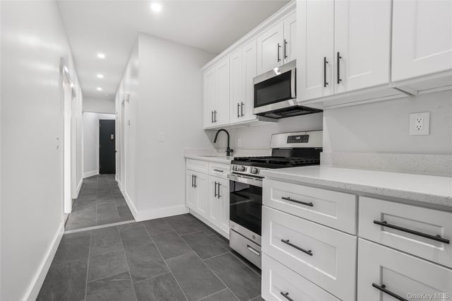 9011 77th Street, Woodhaven, NY 11421