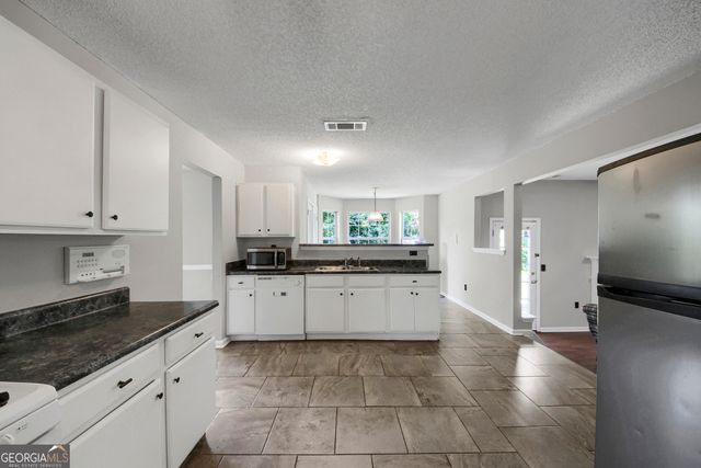 6010 Crooked Creek Drive, Rex, GA 30273