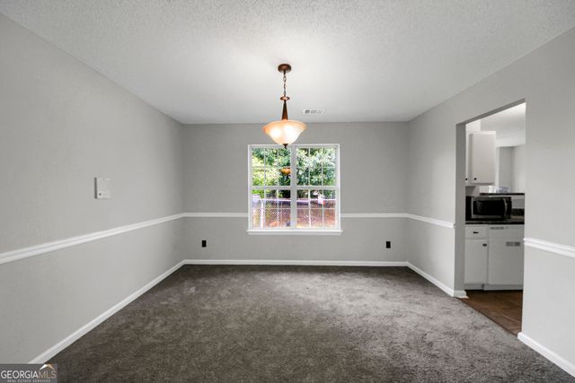 6010 Crooked Creek Drive, Rex, GA 30273