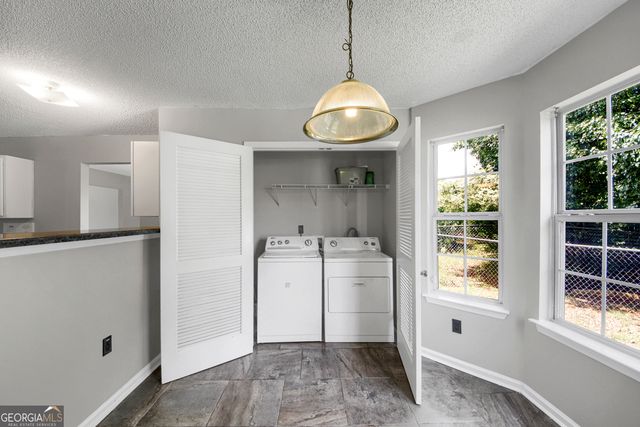 6010 Crooked Creek Drive, Rex, GA 30273