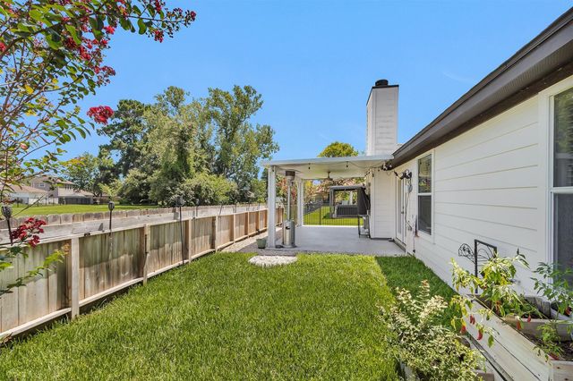 6913 Gentle Breeze Drive, Willis, TX 77318