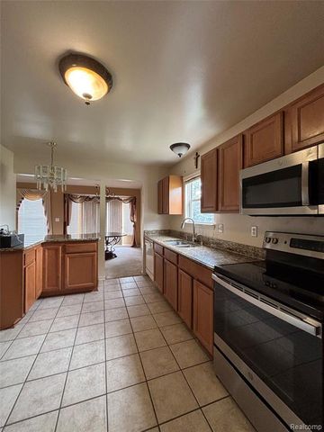 380 Woodhaven Drive, Walled Lake, MI 48390