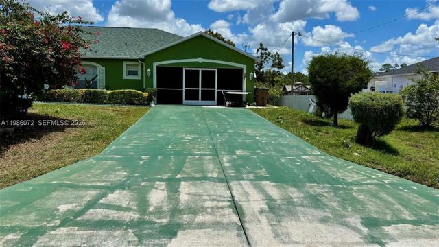 1122 MCKINLEY AVE, Lehigh Acres, FL 33972