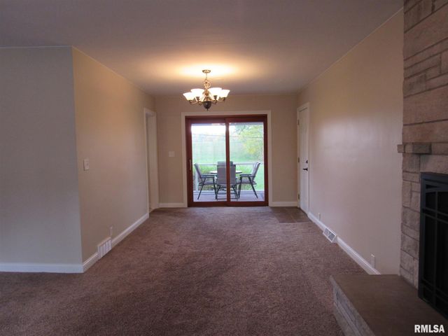 233 MANOR Drive, Riverdale, IA 52722