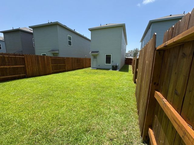 945 Pertuso Lane, Huffman, TX 77336