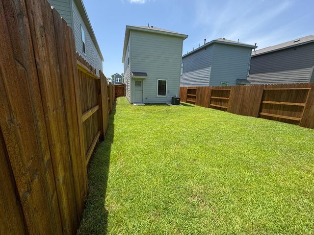 945 Pertuso Lane, Huffman, TX 77336