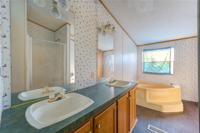 910 County Road 3556, Cleveland, TX 77327
