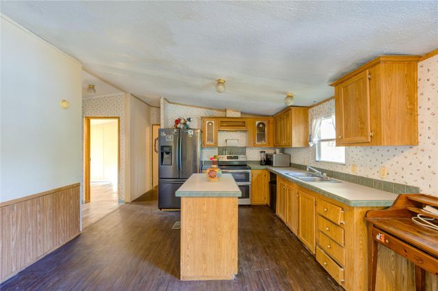 910 County Road 3556, Cleveland, TX 77327