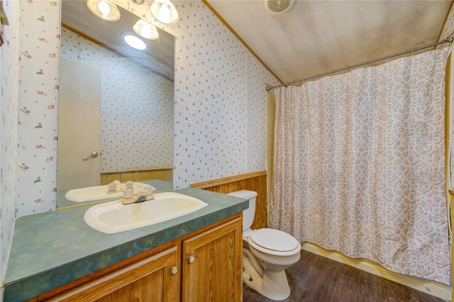 910 County Road 3556, Cleveland, TX 77327