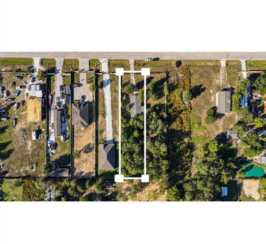 910 County Road 3556, Cleveland, TX 77327