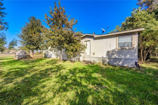 910 County Road 3556, Cleveland, TX 77327
