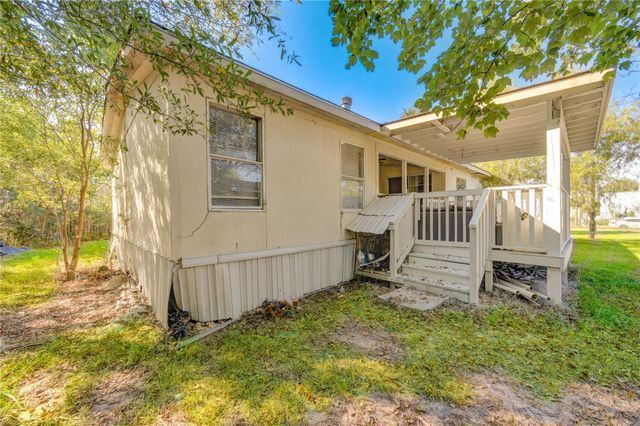 910 County Road 3556, Cleveland, TX 77327