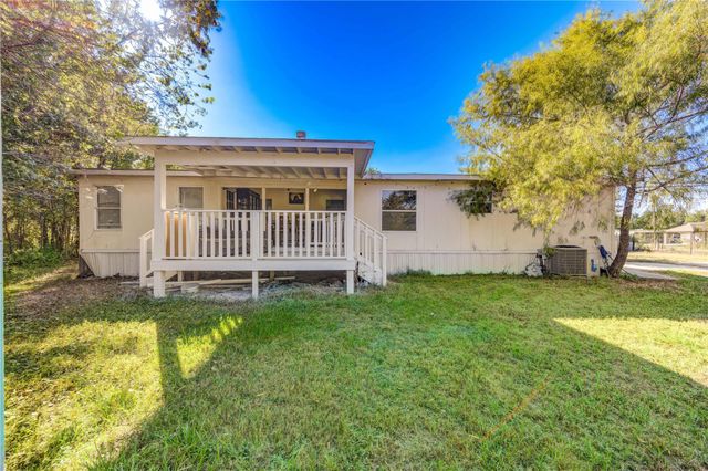 910 County Road 3556, Cleveland, TX 77327
