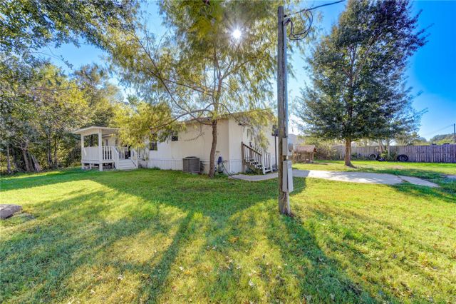 910 County Road 3556, Cleveland, TX 77327