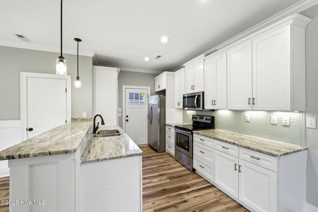 218 NE 76th Street, Oak Island, NC 28465