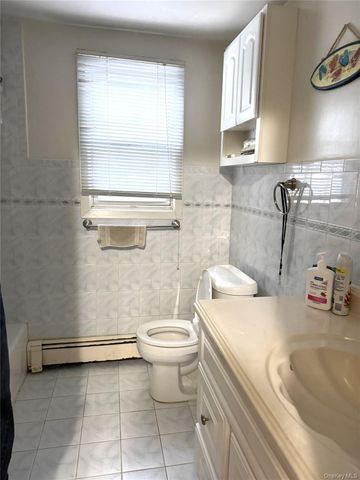 1551 Sweetman Avenue, Elmont, NY 11003