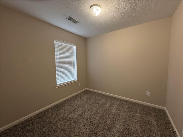 5525 N Buffalo Circle, Willis, TX 77378