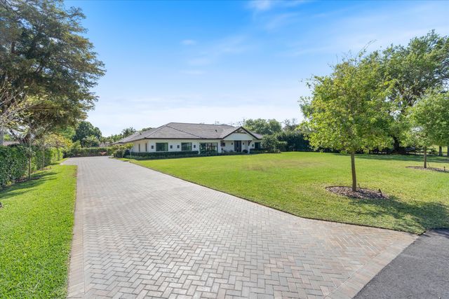 6032 NW 80th Terrace, Parkland, FL 33067