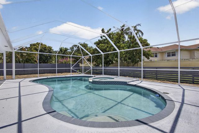 8111 W Lake Drive, Lake Clarke Shores, FL 33406