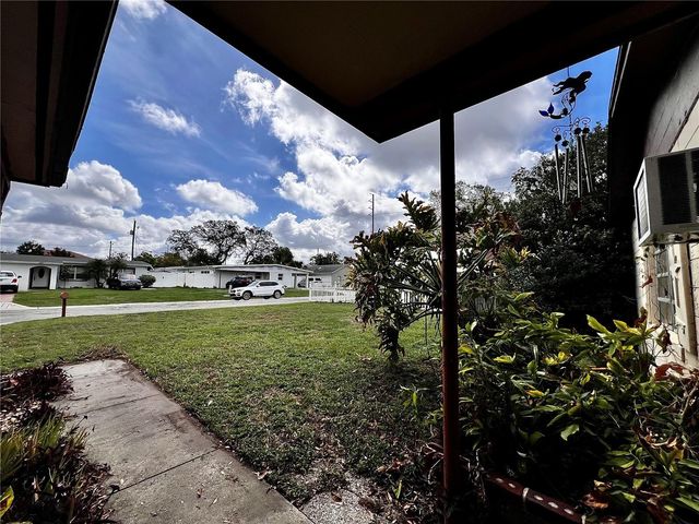 7808 N WOODLYNNE AVENUE, Tampa, FL 33614