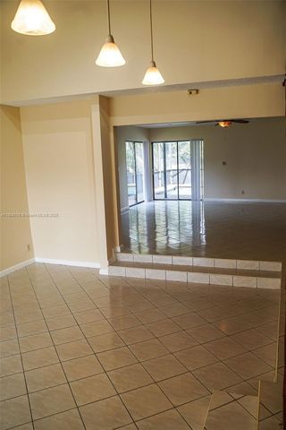 9191 NW 3rd Ct, Coral Springs, FL 33071