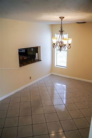9191 NW 3rd Ct, Coral Springs, FL 33071