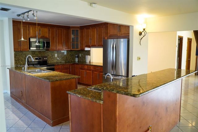9191 NW 3rd Ct, Coral Springs, FL 33071