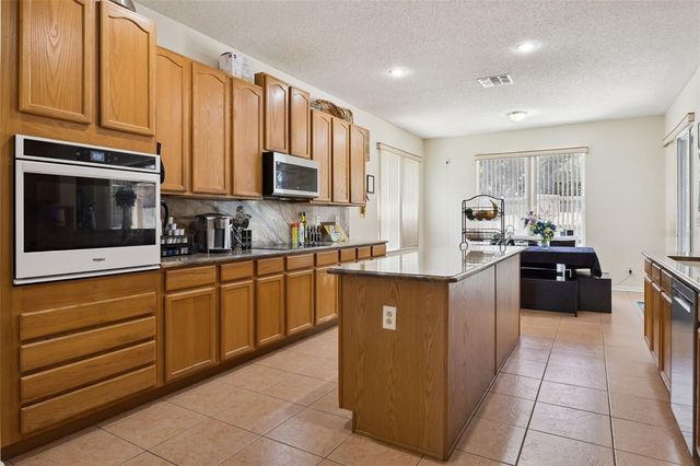 1603 JOHNS COVE LN, Oakland, FL 34787