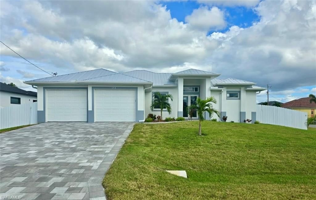 141 SW 35th PL, CAPE CORAL, FL 33991 — photo 2