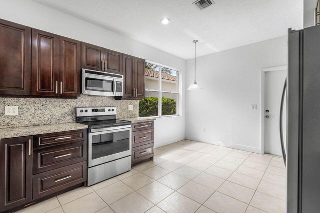 196 Seminole Lakes Drive, Royal Palm Beach, FL 33411
