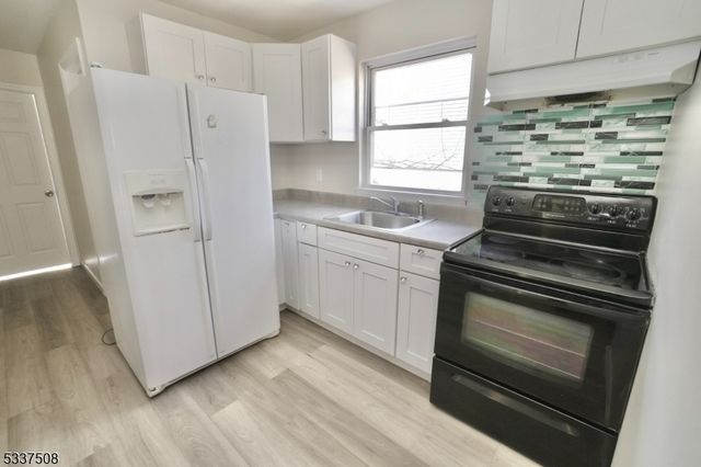 212 N 1St St, Paterson City, NJ 07522