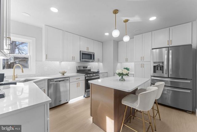 9603 WOODLAND AVE, Lanham, MD 20706