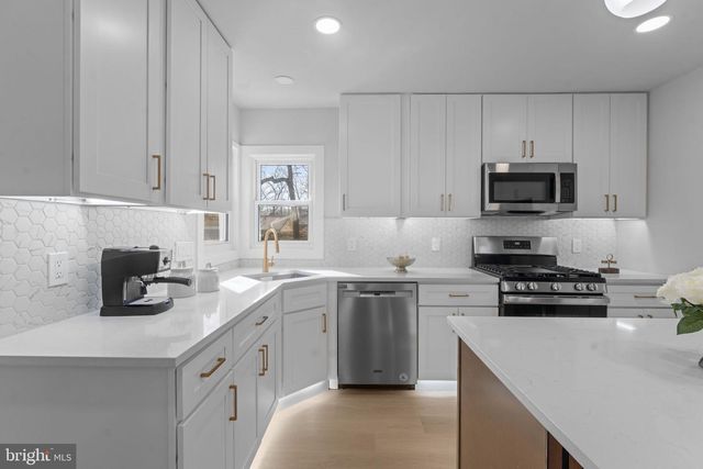 9603 WOODLAND AVE, Lanham, MD 20706