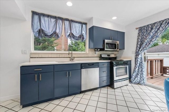 1051 Roselle Place, Woodmere, NY 11598