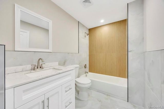 15 Marshall Street, Massapequa, NY 11758