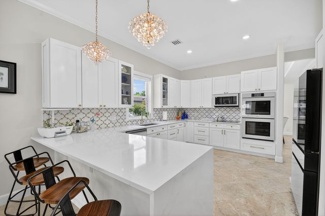 7249 NE Bay Harbour Avenue, Boca Raton, FL 33487