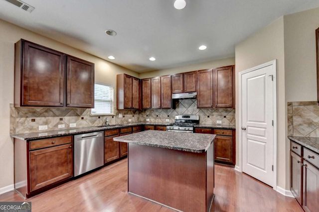 4228 Woods Creek Lane, Suwanee, GA 30024