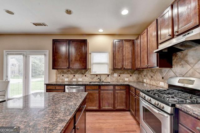 4228 Woods Creek Lane, Suwanee, GA 30024